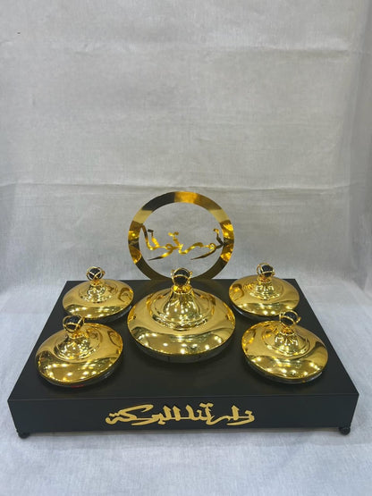 Luxurious Arabic-Inspired Sweet Tray with Gold-Plated Lidded Containers and Elegant Calligraphy